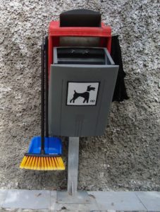 A dog poop bin